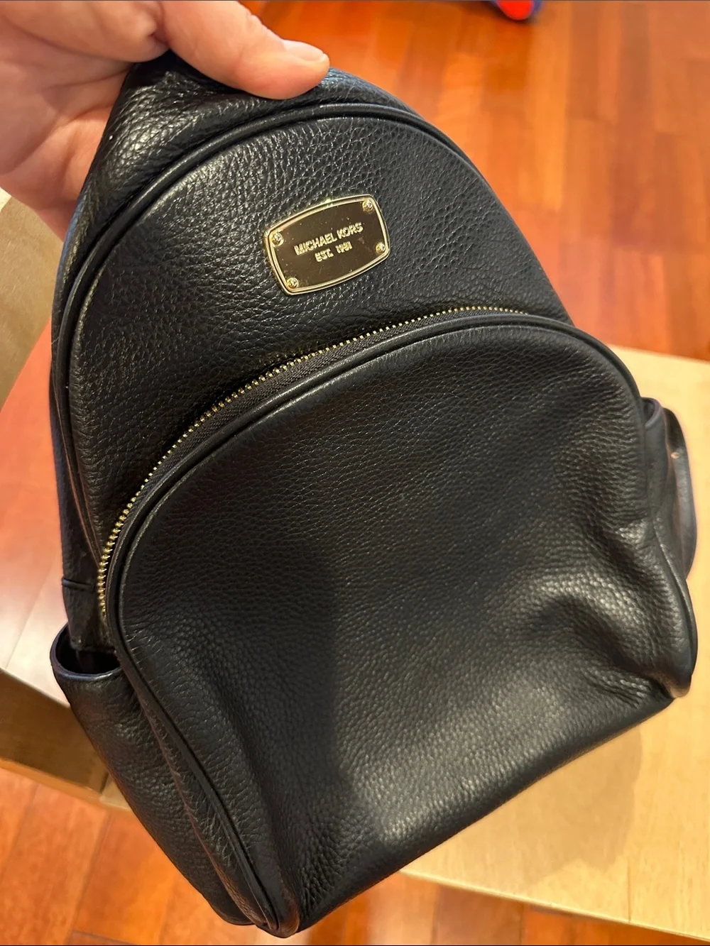 Michael Kors Black Pebbled Leather Mini Backpack with Gold Plaque